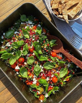 Roasted Mediterranean Tray with Fresh Basil, Feta and Pitta Chips for £1.20☀️?? Click save for this immune boosting tray of fresh, sumptuous food. With the sun shining despite everything right now, I wanted to throw together some delicious, summery food packed with vitamins and minerals. All you need is a baking tray, an oven and 15 minutes from start to finish ? #LessThan2 —————————————————————— Ingredients - Serves 4

800g chickpeas (80p)
330g cherry tomatoes (90p)
150g curly kale (92p)
100g feta cheese (48p)
3 tbsp balsamic vinegar (9p)
3 tbsp olive oil (9p)
2 tbsp Pesto (26p)
20g Fresh Basil Leaves (46p)
50g Pomegranate Seeds (50p)
4 Pitta Breads (30p)
Salt & Pepper —————————————————————— You’ll need a large baking tray. Preheat the oven to 200°C. 
1. Halve the cherry tomatoes then put the chickpeas and tomatoes in a large baking dish. Drizzle with the vinegar and oil, add a pinch of salt & pepper then toss to combine. Roast for 10 mins or until the tomatoes are starting to soften slightly. 
2. Switch the oven to the grill on a medium/high setting. Add the kale to the baking dish and toss gently. Pop under the grill for 3-4 mins or until the kale is slightly toasted. 
3. Stick your pittas in the toaster for 2-3 minutes until toasted but not crispy. 
4. In the mean time, top traybake with pesto and feta then scatter with the basil and pomegranate seeds. 
5. Serve with some toasted pitta.